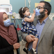 Ayla Bashir with her parents.